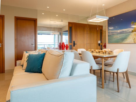 Stylish living room in Salvador, Brazil featuring modern decor, cozy furniture, and vibrant accents.